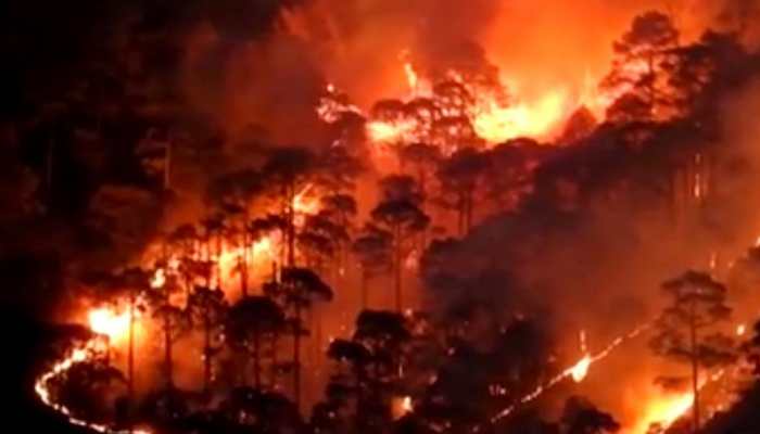 Uttarakhand forest fire: IAF helicopter helps in fire fighting operations at Tehri Garhwal