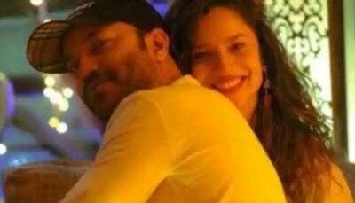 Ankita Lokhande blushes as beau Vicky Jain gives her a quick kiss while dancing - Watch