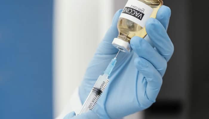 Here's what to do when you feel feverish or get swelling after taking COVID-19 vaccine