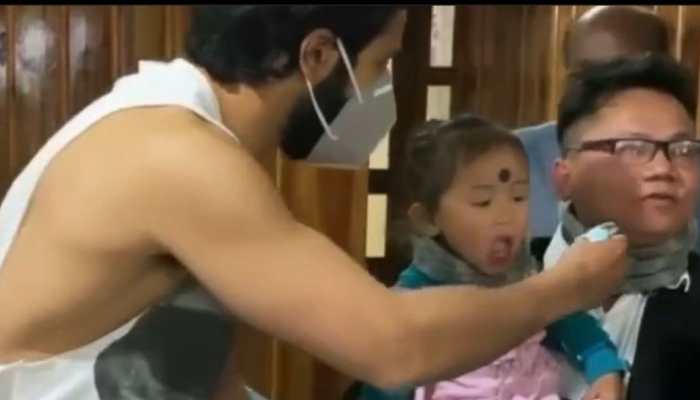 Kriti Sanon shares hilarious video of Varun Dhawan 'betraying' little girl, Anushka Sharma, Farhan Akhtar can't get over it! - WATCH