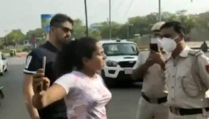 Drama on Delhi streets: Couple misbehaves with cops when asked about not wearing masks -- WATCH