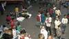 As Delhi enters COVID-19 lockdown, migrant workers scramble to leave national capital