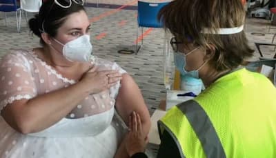 This bride gets COVID-19 vaccine in a wedding gown, pics go viral - See inside