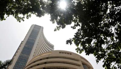 Sensex declines 202 points after choppy trade; Nifty ends below 14,350
