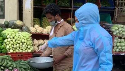 Rakhi Sawant wears PPE kit for grocery shopping, fans hail her saying 'she's better than most politicians'