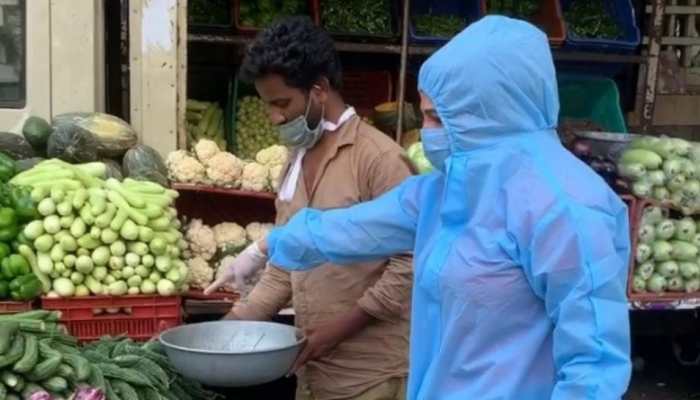 Rakhi Sawant wears PPE kit for grocery shopping, fans hail her saying 'she's better than most politicians'