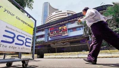 Sensex sees 690 pts recovery, ends 64 pts down; Nifty inches up to 14,634 led by metals and FMCG