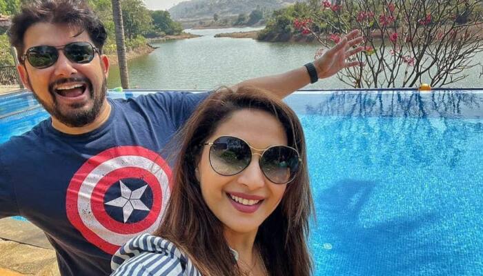 Madhuri Dixit hugs husband Sriram Nene tightly in this adorable throwback photo!