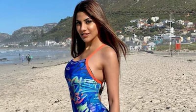Nikki Tamboli brings back 'Baywatch' vibes in a hot black bikini, poses with 'desi boys' Varun Sood and Vishal Singh - Pics
