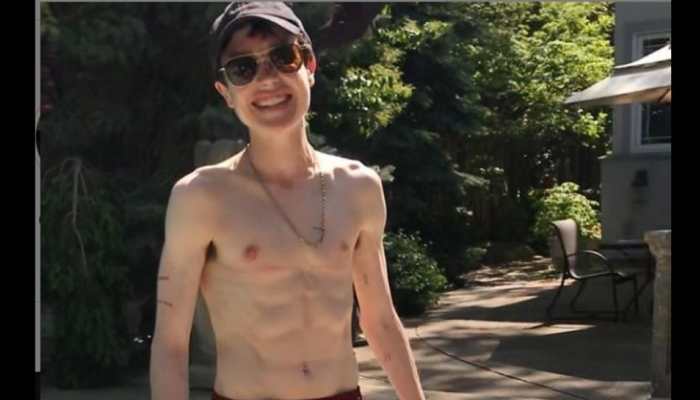 Elliot Page posts a landmark shirtless photo in 'first swim trunks'