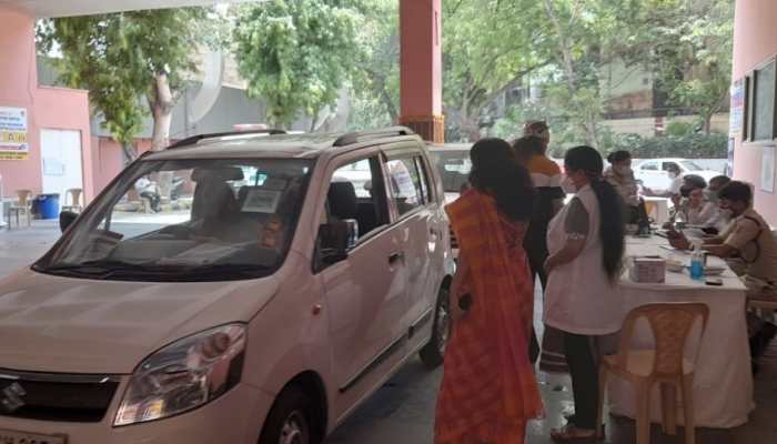 Delhi's first drive-through COVID-19 vaccination centre at Chhatrasal Stadium, see pics