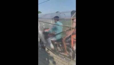 Desi Jugaad! Man turns his motorcycle into a bubble amid COVID-19, watch video