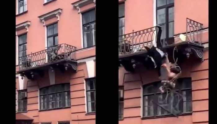 Couple arguing on balcony fall 25-feet below on footpath, video goes viral