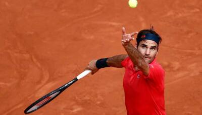 French Open: Roger Federer happy to find higher gear against Marin Cilic