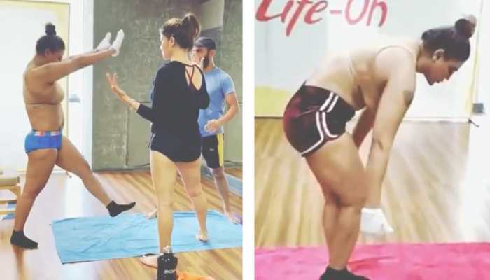 Rakhi Sawant's hot yoga video goes viral, netizens troll her for 'naked' outfit- Watch