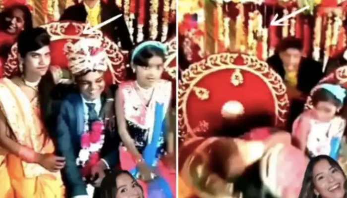 Bride's sister starts kissing groom on wedding stage- WATCH