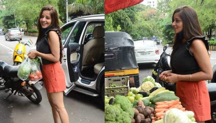 Bhojpuri sensation Monalisa spotted buying veggies in orange shorts and black top, smiles at paps - In Pics