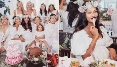 Preggers Lisa Haydon looks ethereal in white, enjoys her floral-themed baby shower! - See pics