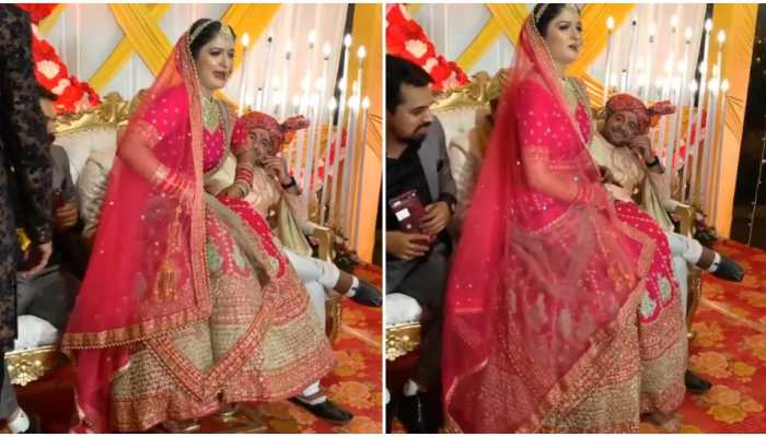 Bindaas dulhan! Bride sits on groom&#039;s lap as his friends occupy her place, viral video