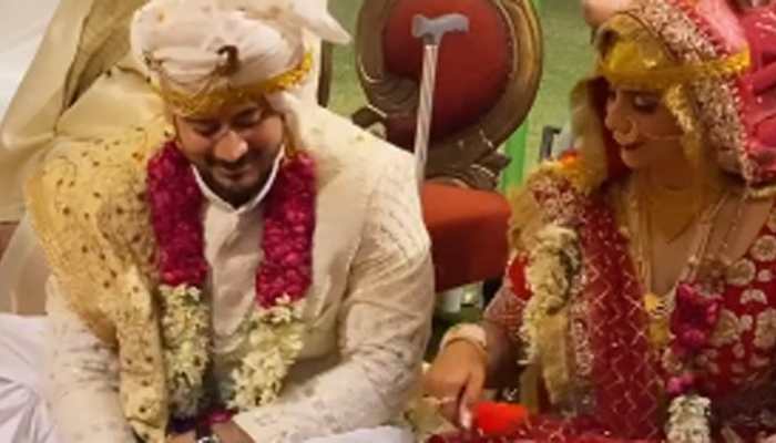Viral video: This Kashmiri dulha-dulhan play 'flip the bottle' during 'rest time' amid shaadi rituals - Watch