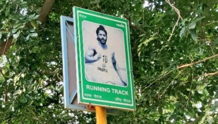 Farhan Akhtar&#039;s picture from &#039;Bhaag Milkha Bhaag&#039; put up on running track in Noida Stadium, removed after backlash