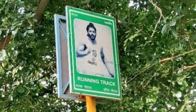 Farhan Akhtar's picture from 'Bhaag Milkha Bhaag' put up on running track in Noida Stadium, removed after backlash