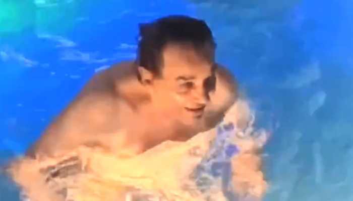 Dharmendra does water aerobics on international yoga day at his swimming pool, fans hail his fitness - Watch