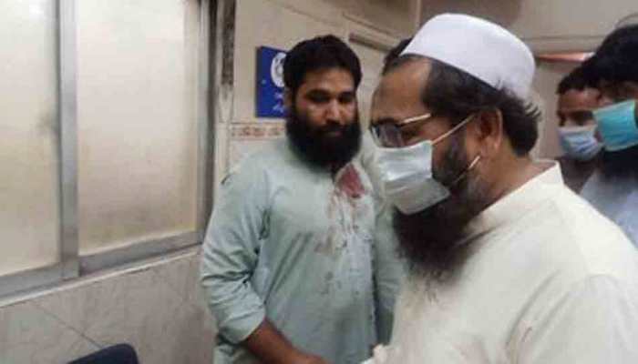Hafiz Saeed&#039;s son Talha meets JuD worker at hospital after Lahore blast