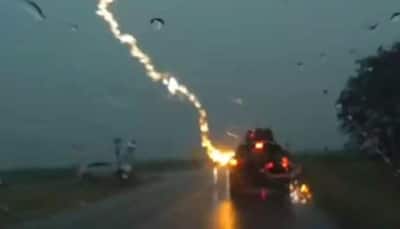 Caught on camera: Lightning strikes car carrying family of five - Watch