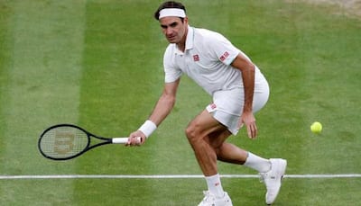 Wimbledon: Roger Federer weathers Sonego storm to march into quarters