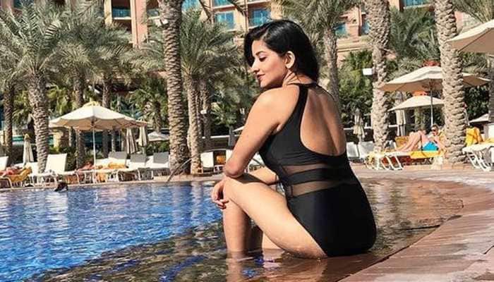 Bhojpuri siren Monalisa chills by the pool in a black bikini, raises hotness bar with THIS pic!