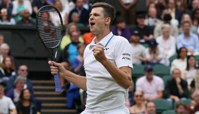 Wimbledon 2021: Hurkacz stuns Medvedev to set clash with Federer in quarters