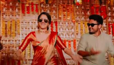 Viral video: Kerala bride dancing to South Indian song in red silk saree is whistle-worthy!