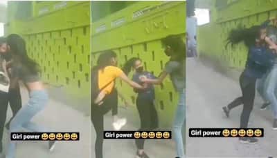 Cat fight! Young girls kick each other in middle of street, video goes viral | WATCH
