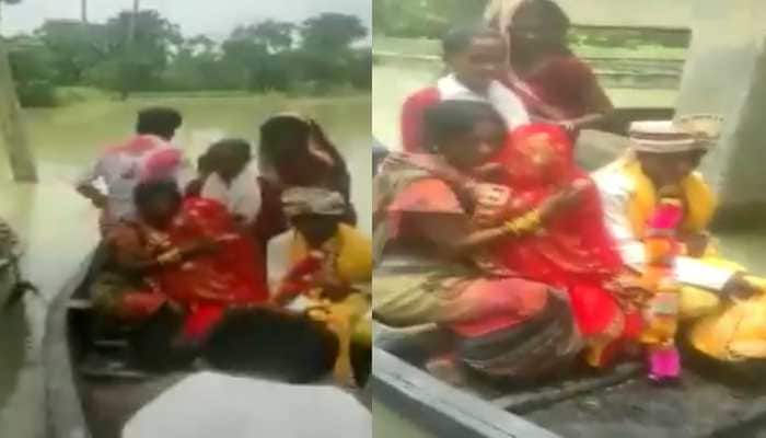 Bihari dulha reaches wedding venue with &#039;baaratis&#039; in boats amid raging floods, video goes viral
