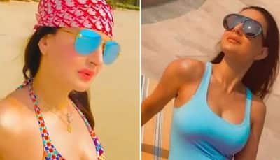 Ameesha Patel sets internet on fire, strikes sultry pose in colourful bikini! - Watch