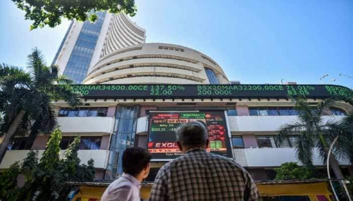 Sensex, Nifty end flat in highly volatile trade; realty stocks rally