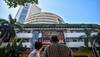 Sensex, Nifty end flat in highly volatile trade; realty stocks rally