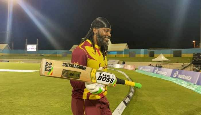 West Indies batsman Chris Gayle celebrates after scoring 67 against Australia in the third T20 international. (Source: Twitter)