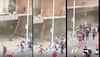 South African mother throws 2-year-old child from burning building amid riots