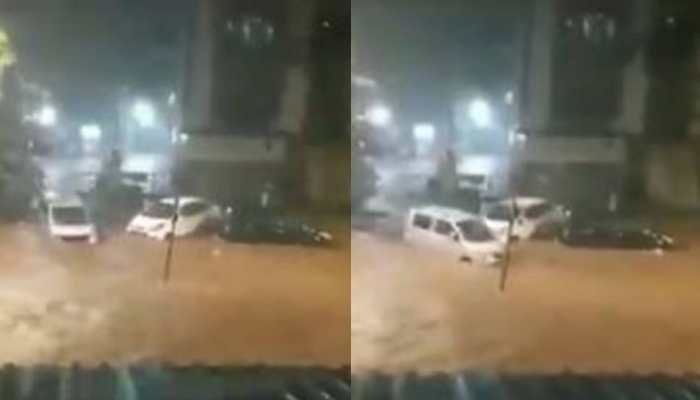 Cars swept away in waterlogged streets as heavy rains lash Mumbai