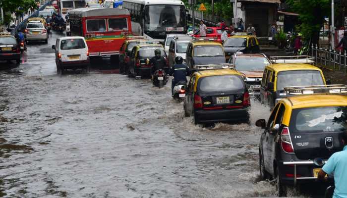 Heavy showers continue to batter Mumbai, affect local train services 
