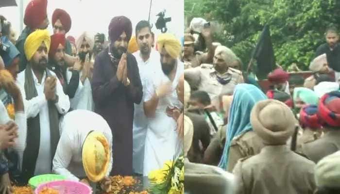 Navjot Singh Sidhu, the newly appointed Punjab Congress chief, shown black flags by farmers opposing farm laws in Ludhiana 