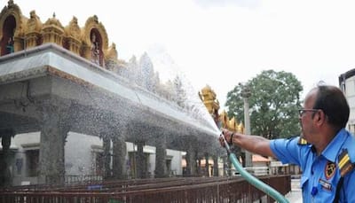 Karnataka further relaxes COVID-19 curbs, allows religious places, amusement parks to reopen