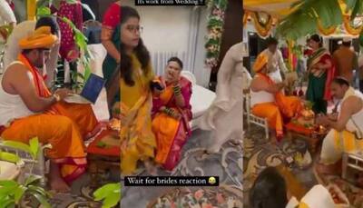 Dulha sitting in 'mandap' opens laptop to finish work, bride has a hearty laugh - Watch