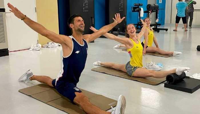 World No. 1 tennis player Novak Djokovic doing splits with the Belgium national gymnastics team at the Tokyo Olympics Games Village. (Source: Twitter)