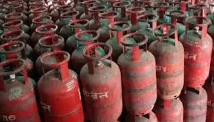 LPG price hike! Price of 19 kg gas cylinder increased by Rs 73.5, check rates in your city | Economy News | Zee News