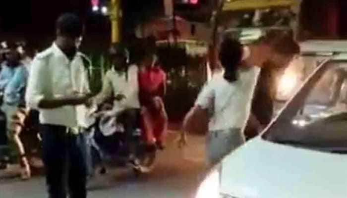 Arrest Lucknow Girl' trends after woman thrashes cabbie, breaks his phone on busy street | viral News | Zee News
