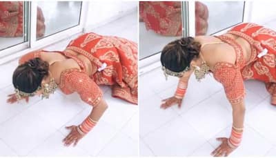 Watch viral video of fitness freak bride doing push-ups in Lehenga