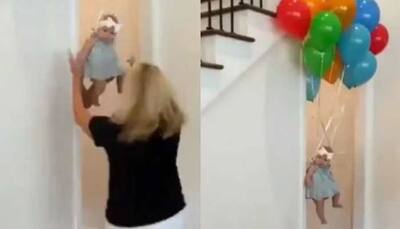 Woman's reaction on seeing 'flying baby' will leave you in splits- Watch viral video